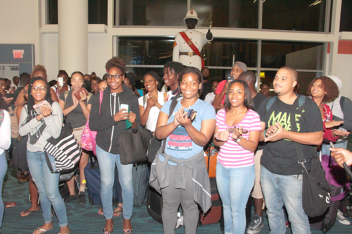 Students studying in Jamaica came home Saturday night ahead of the impact of Hurricane Matthew on that island. A Bahamasair flight, accommodating 120, left Norman Manley International Airport in Kingston last night and brought them into LPIA, where they were welcomed home by Prime Minister the Rt. Hon. Perry Christie, other officials, and family. (BIS Photos/Eric Rose)