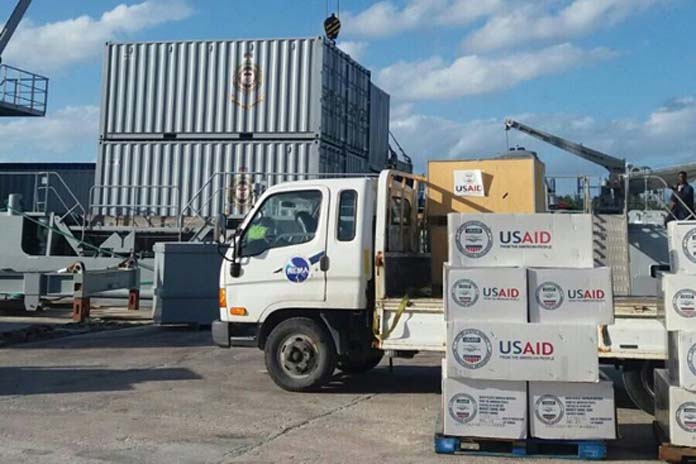 Relief supplies donated by the United States Agency for International Development/Office of Foreign Disaster Assistance (USAID/OFDA), being loaded on to The HMBS Lawrence Major on Tuesday, October 11 with much needed supplies for residents in North Andros, one of the areas hardest hit by the Category 4 Hurricane Matthew. (PHOTO/NEMA) 