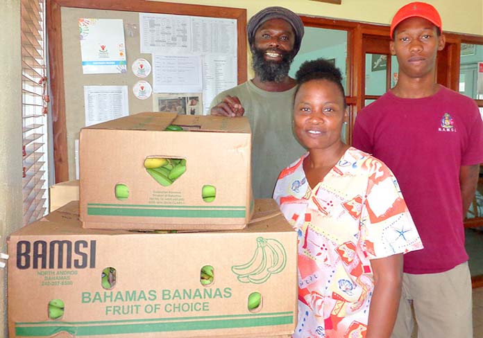 Making sure the nation’s most vulnerable are protected and supported, BAMSI donated bananas to The Ranfurly Home for Children, which currently houses some 26 residents. Pictured from left are Cambridge Cooper, BAMSI’s distribution team member; Judyanne Hepburn, supervisor with the Ranfurly Home and Devontae Thurston, a member of BAMSI’s distribution team. 