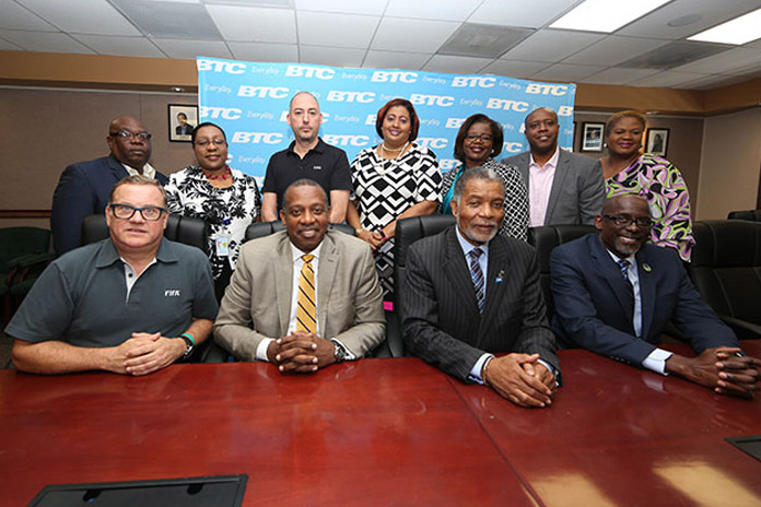 BTC Executives & FIFA Officials. Back Row L to R: Naaman Ellis (CNO), Helene Ferguson (SVP, Human Resources), Jaime Yarza (Director of Competitions), Nicole Watkins (VP, Legal & Regulatory). Janet Brown (CMO, SVP, Marketing), Alban Smith (CIO), Carol Barnett (Senior Manager, Advertising, Events & Sponsorships). Front Row L to R: Joan Cusco (President Beach Soccer Worldwide), Anton Sealy (President, BFA), Leon Williams (CEO, BTC), Jeffrey Beckles (LOC Chairman)