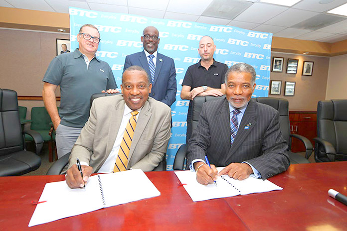 BTC & FIFA sign National Partner contract for exclusive telecommunications services. Back Row L to R: Joan Cusco (President Beach Soccer Worldwide), Jeffrey Beckles (LOC Chairman), Jaime Yarza (Director of Competitions, FIFA). Seated. Anton Sealy (BFA President), Leon Williams (CEO, BTC) 