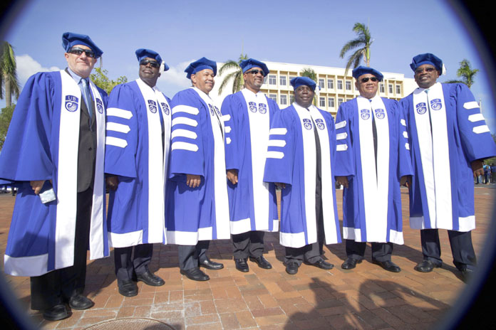 UB Charter Day, November 10, 2016 – From left: UB Board of Trustees Secretary Michael Stevenson, UB Board of Trustees Chairman Dr. Earl Cash, UB President Dr. Rodney D. Smith, Minister of Education Science & Technology the Hon. Jerome Fitzgerald, Deputy Prime Minister and Minister of Works and Urban Development the Hon. Philip Davis, Prime Minister and Minister of Finance the Rt. Hon. Perry G. Christie, and Leader of the Official Opposition Free National Movement the Hon. Dr. Hubert Minnis.  (BIS Photo/Derek Smith)