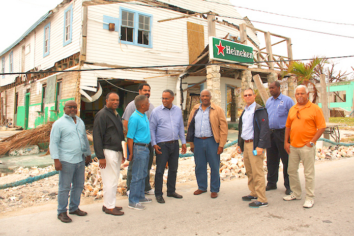 Pictured from left in West End, Grand Bahama: Preston Cunningham, Senior Administrator for Grand Bahama; Melvin Seymour, Permanent Secretary; Jack Thompson, Permanent Secretary; Gowon Bowe, disaster relief committee; the Hon. Dr. Michael Darville, Minister for Grand Bahama; Nathaniel Beneby, disaster relief committee; Mike Maura, disaster relief committee; Captain Stephen Russell, Director, NEMA; and Tracey Knowles, disaster relief committee. (BIS Photo/Patrick Hanna)