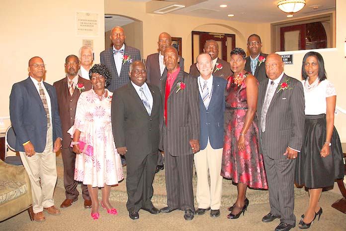 The Hon Philip Davis, Deputy Prime Minister and Minister of Works and Urban Development (centre left) is pictured with 2016 retirees of the Ministry of Work and Urban Development at the 4th annual Retirement Luncheon. Also shown (centre right) is Colin Higgs, Permanent Secretary. (BIS Photo/Patrick Hanna)