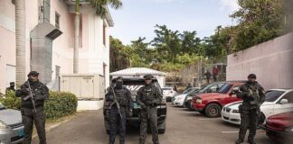 Bahamian police arrest 8 Americans and seized weapons, ammunition and a “considerable sum of undeclared cash” in Bimini