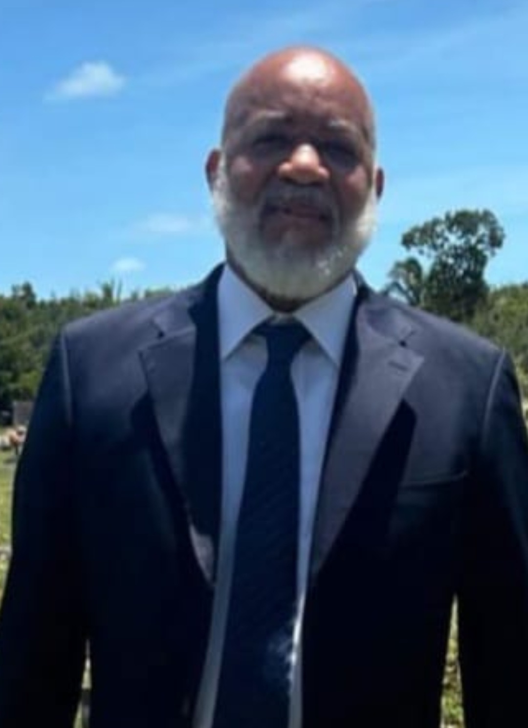 Trade unionist Perry Cox found dead with stab wounds near the door of a burning apartment in Nassau Village 2am this morning…