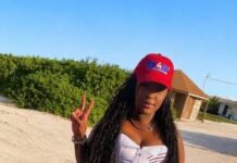 Grade two FNM security officer Carlesha Bain tried to digup inside Prime Minister Davis bags – well what is dis?